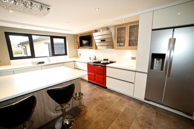 Family 'heart of the home' fitted kitchen with AGA | Keller Design