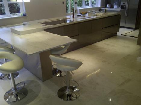 Corian worktops feature on large island with Quooker Hot Tap