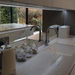 sink area of the worktop with seamlessly moulded bowl and integrated drainer grooves