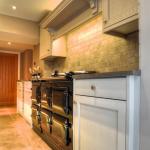 Aga cooker under traditional canopy