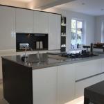 Island with Chefs preparation sink, Atag gas hob and Air Uno downdraught extractor.