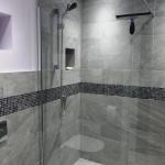 Ensuite wet room showing Mira shower and variegated grey tiles from Casa Ceramica