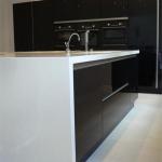 Fitted kitchen features Corian sinks with a Blanco Hot Tap.